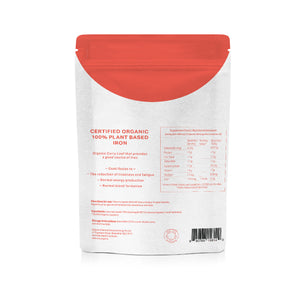 The back of a stand-up pouch package for Certified Organic 100% Plant Based Iron, featuring red text and a red seal on a white background with a red curved accent at the top.