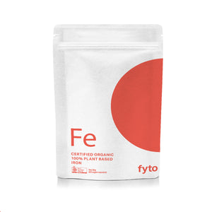 A white stand-up pouch of FYTO Iron supplement with a large red circle on the right side and red text reading 'Fe' and 'CERTIFIED ORGANIC 100% PLANT BASED IRON'.