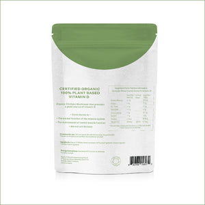 The back of a stand-up pouch package for Certified Organic 100% Plant Based Vitamin D, featuring a white background with a green curved accent at the top and black text details.