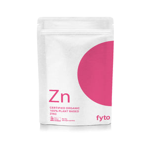 A white stand-up pouch of FYTO Zinc dietary supplement, featuring a large pink circle on the right side and pink text reading 'Zn' and 'Certified Organic 100% Plant Based Zinc'.