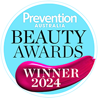 A circular award badge reading 'Prevention Australia Beauty Awards Winner 2024' with a light blue background and a magenta ribbon across the bottom.