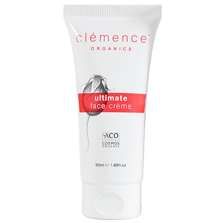 A 50ml white squeeze tube of Clémence Organics Ultimate Face Crème, featuring a red banner and a floral graphic on the front.